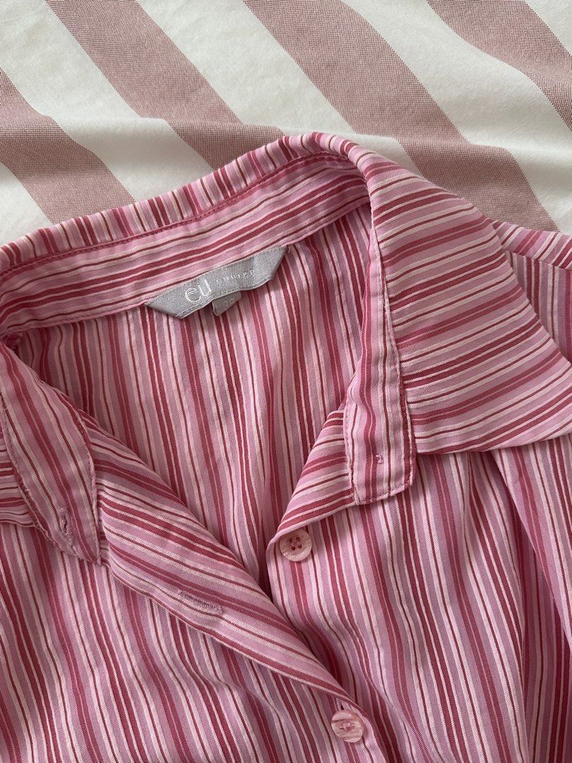 Pink Striped Button-Up Blouse polo (Category: Blouses) located in Davao. Submitted by beys.corner (Listing ID 1442351045, Image 2). Description: Fits S-M - Cute pink and white striped button-up blouse - Long sleeves with button cuffs - Collared neckline - Lightweight material, ideal for layering or wearing alone - Versatile for casual or smart-casual styling.