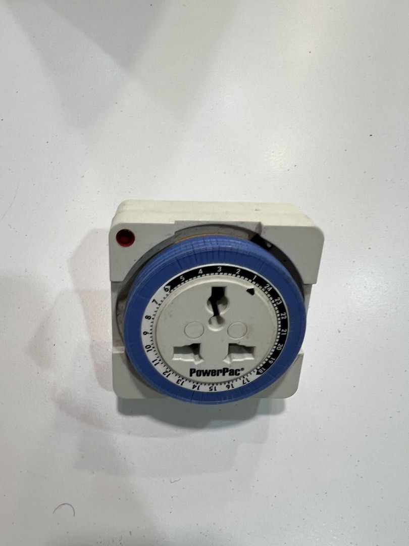PowerPac Timer Plug with Universal Socket (Category: Electrical, Adaptors & Sockets) located in Singapore. Submitted by kangkae (Listing ID 1442490679, Image 1). Description: - PowerPac Timer Plug - Universal socket fits various plugs - Set on/off times for up to 24 hours - Ideal for controlling appliances - Tested and in good working condition.