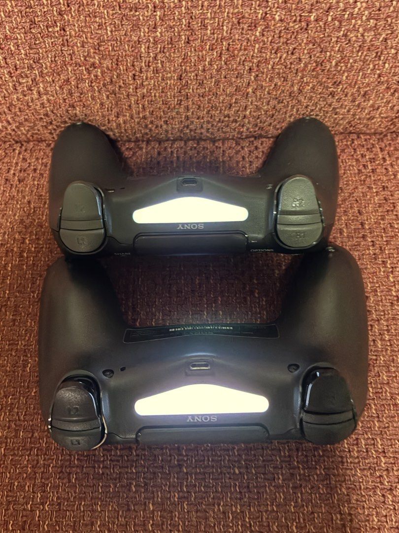 PS4 Controller (Category: Controllers) located in Singapore. Submitted by jiajun1315 (Listing ID 1431873478, Image 3). Description: $35 each $60 For Both all parts are working good battery is working .