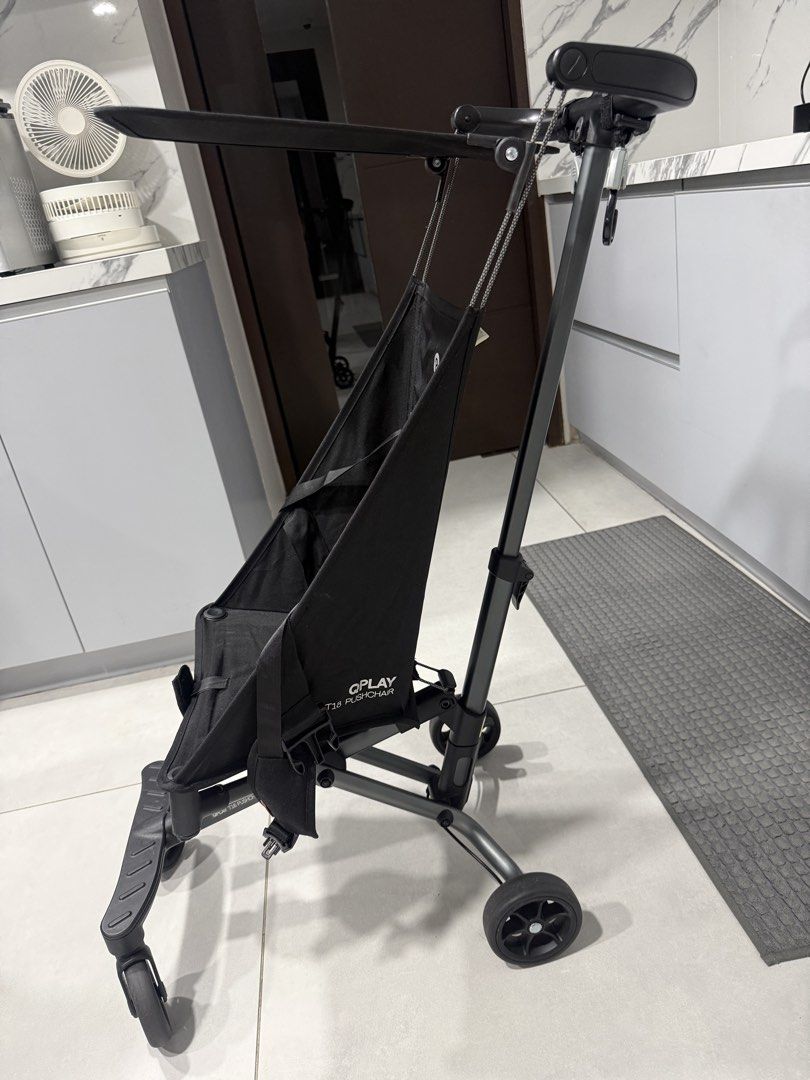 Q Play Stroller Compact Lightweight Travel Stroller (Category: Strollers) located in Quezon City. Submitted by anya_cruz (Listing ID 1442463596, Image 2). Description: - Compact and lightweight black Q Play stroller - Effortless maneuverability with swivel wheels - Secure 5-point harness for child's safety - Adjustable canopy for sun protection - Folds compactly for easy storage and travel - Ideal for families on the go.