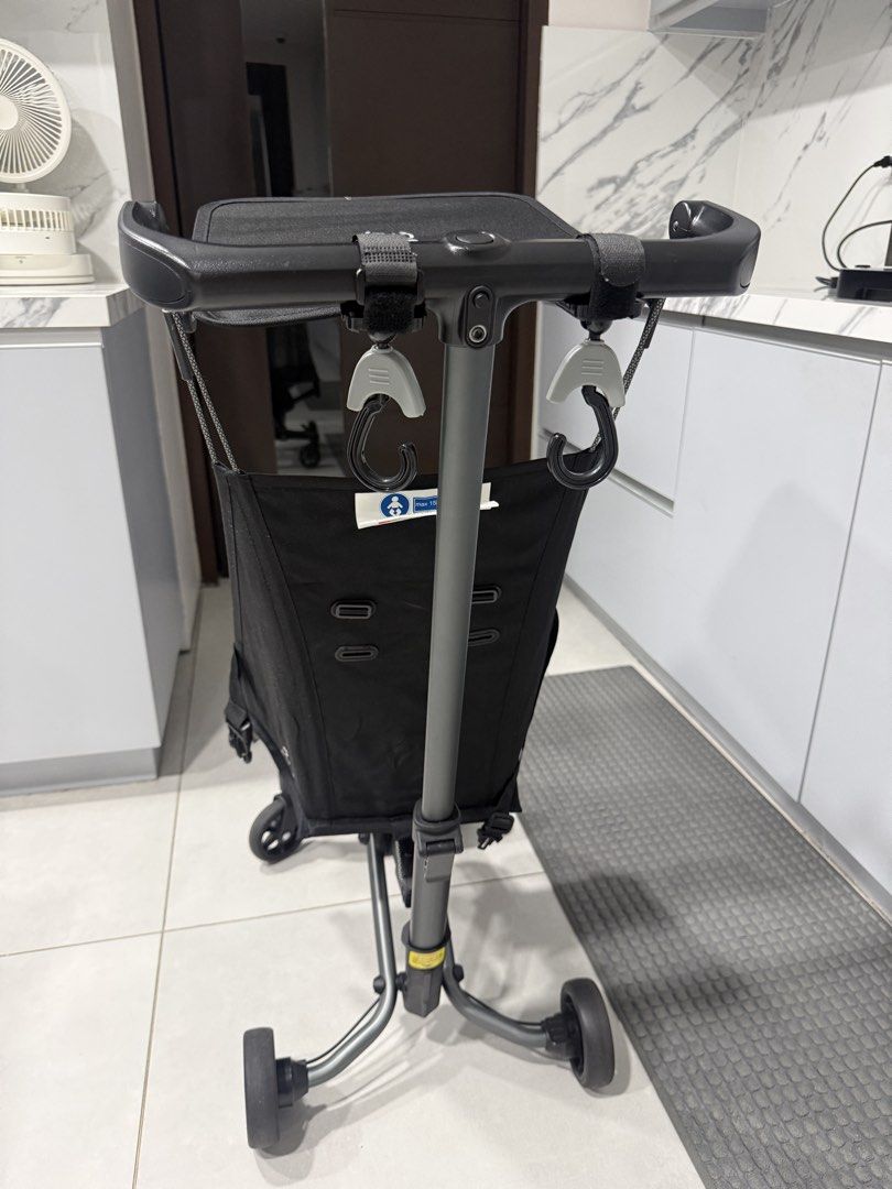 Q Play Stroller Compact Lightweight Travel Stroller (Category: Strollers) located in Quezon City. Submitted by anya_cruz (Listing ID 1442463596, Image 3). Description: - Compact and lightweight black Q Play stroller - Effortless maneuverability with swivel wheels - Secure 5-point harness for child's safety - Adjustable canopy for sun protection - Folds compactly for easy storage and travel - Ideal for families on the go.