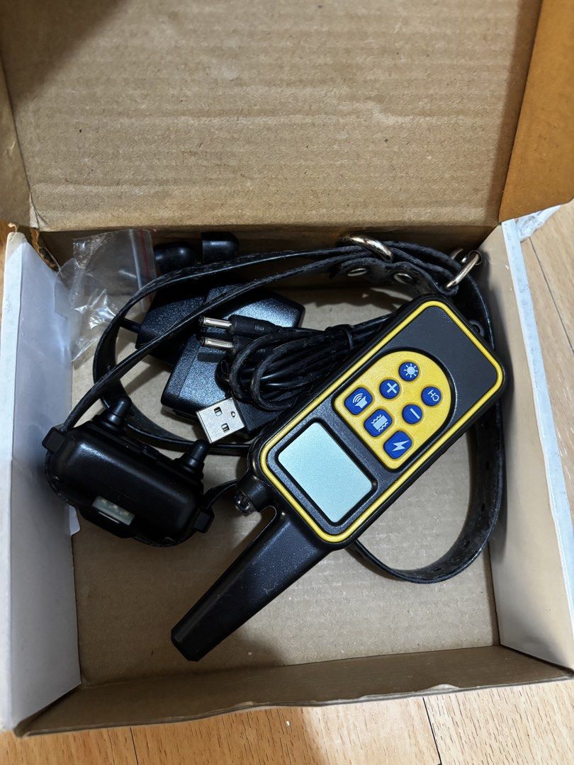 Rechargeable Waterproof Dog Training Collar Remote (Category: Homes & Other Pet Accessories) located in Manila. Submitted by dke_hmn (Listing ID 1442413328, Image 2). Description: - Rechargeable & Waterproof Dog Training Collar - Remote Range: Up to 800 meters - 99 Levels of Static (Optional) & Vibration - Expandable to 3 Dogs (Extra Collar Optional) - Includes: Remote, Receiver Collar, USB Charger, Adapter.