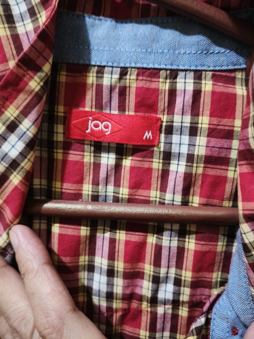 Red Plaid Short Sleeve Button-Up Shirt (Category: Shirts) located in Marikina City. Submitted by lorence11 (Listing ID 1442519001, Image 3). Description: - Classic red plaid short sleeve shirt - Two chest pockets with button closures - Light blue accents on collar and cuffs - Button-up front - Ideal for casual wear.