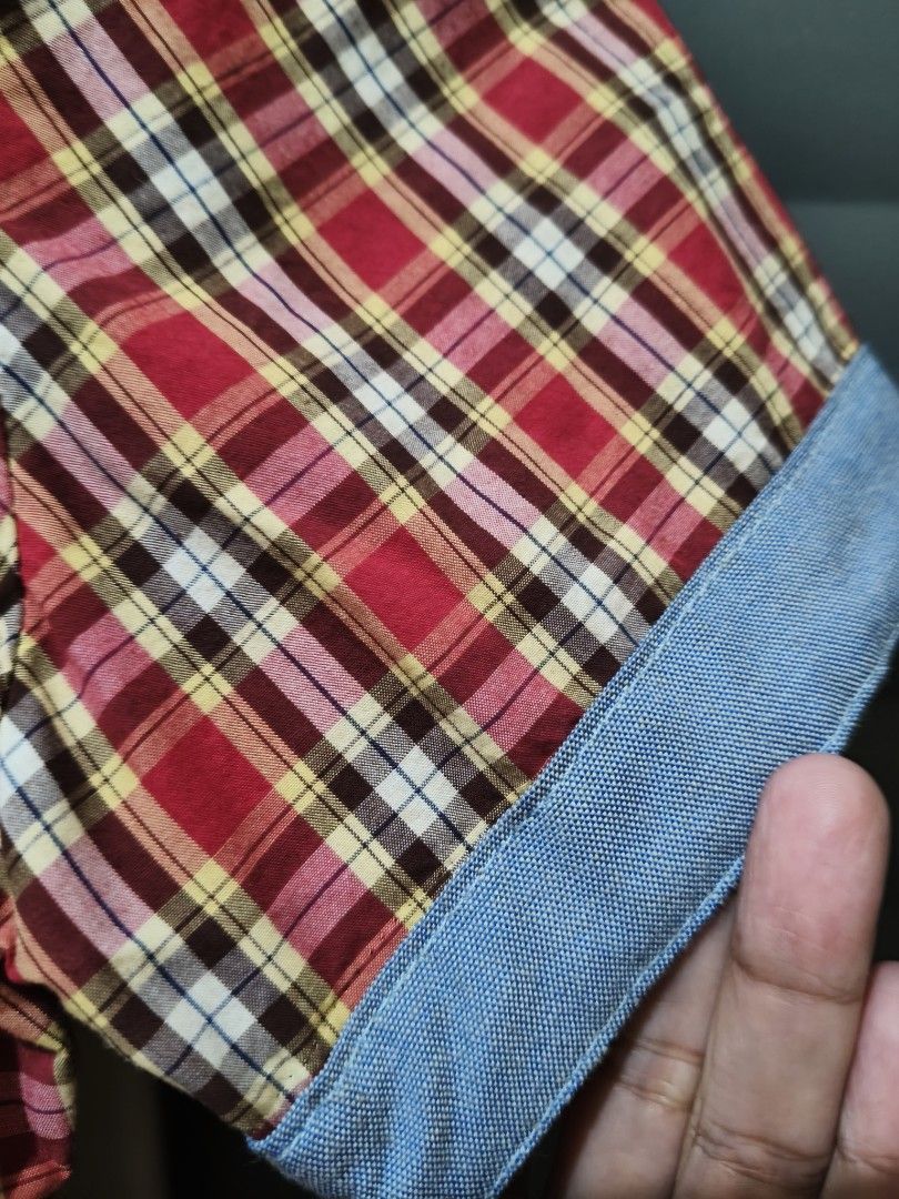 Red Plaid Short Sleeve Button-Up Shirt (Category: Shirts) located in Marikina City. Submitted by lorence11 (Listing ID 1442519001, Image 2). Description: - Classic red plaid short sleeve shirt - Two chest pockets with button closures - Light blue accents on collar and cuffs - Button-up front - Ideal for casual wear.