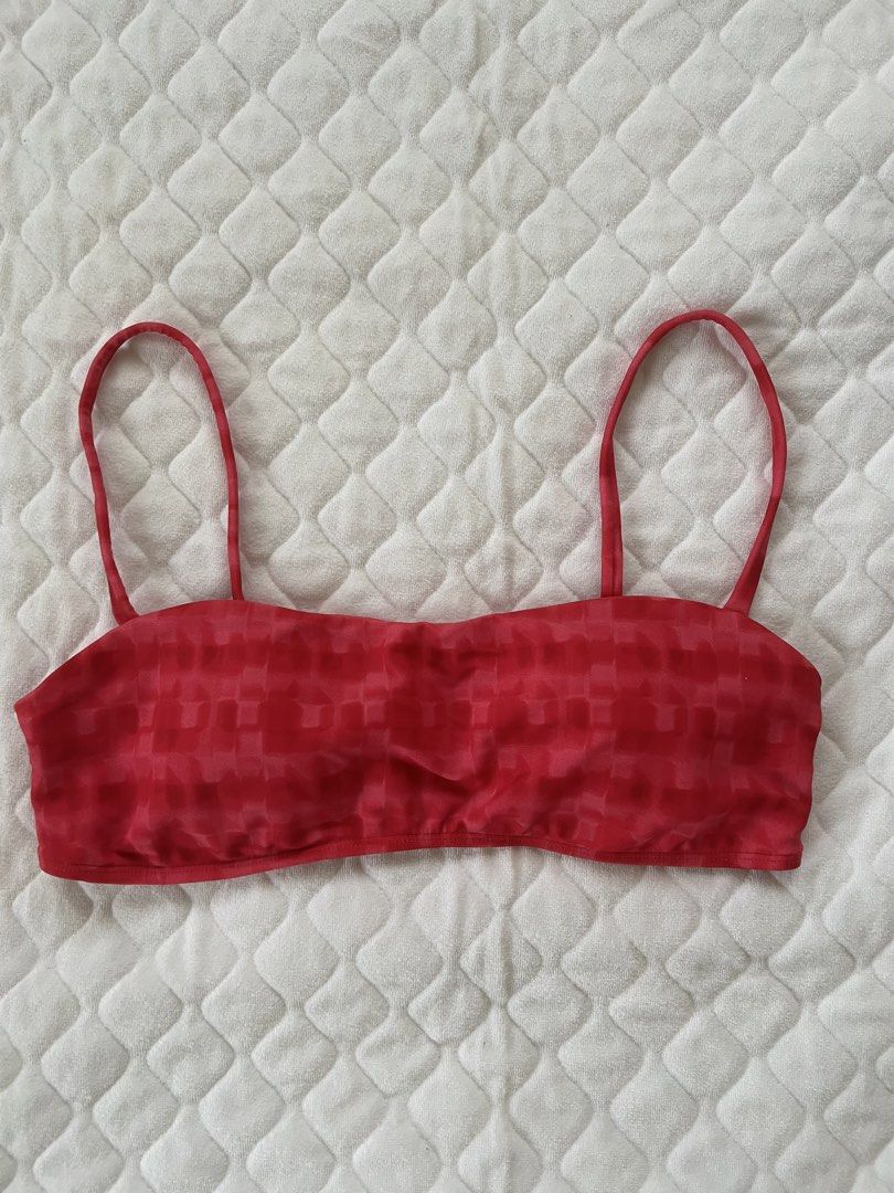 Red Textured Bandeau Bikini Top (Category: Bikinis & Swimsuits) located in Taguig. Submitted by mavillanueva (Listing ID 1442541425, Image 1). Description: - Red bandeau bikini top - Subtle textured pattern - Thin, adjustable straps - Perfect for beach or pool days.