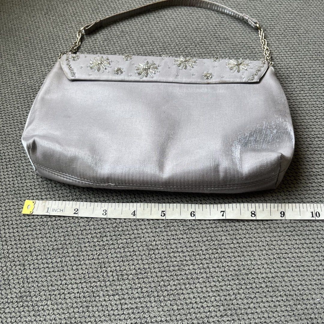 Silver Beaded Japan Mini Shoulder Party Bag (Category: Shoulder Bags) located in Silang. Submitted by f4iry4rch1ve (Listing ID 1442440448, Image 3). Description: Silver Beaded Japan Mini Shoulder Party Bag 650 php+ sf Condition: 10/10 Dimensions: view the pictures above -from Japan -1 compartments, 1 pocket inside - actual photos Note: Colors may vary due to lighting Please message me for shipping and payment method... .
