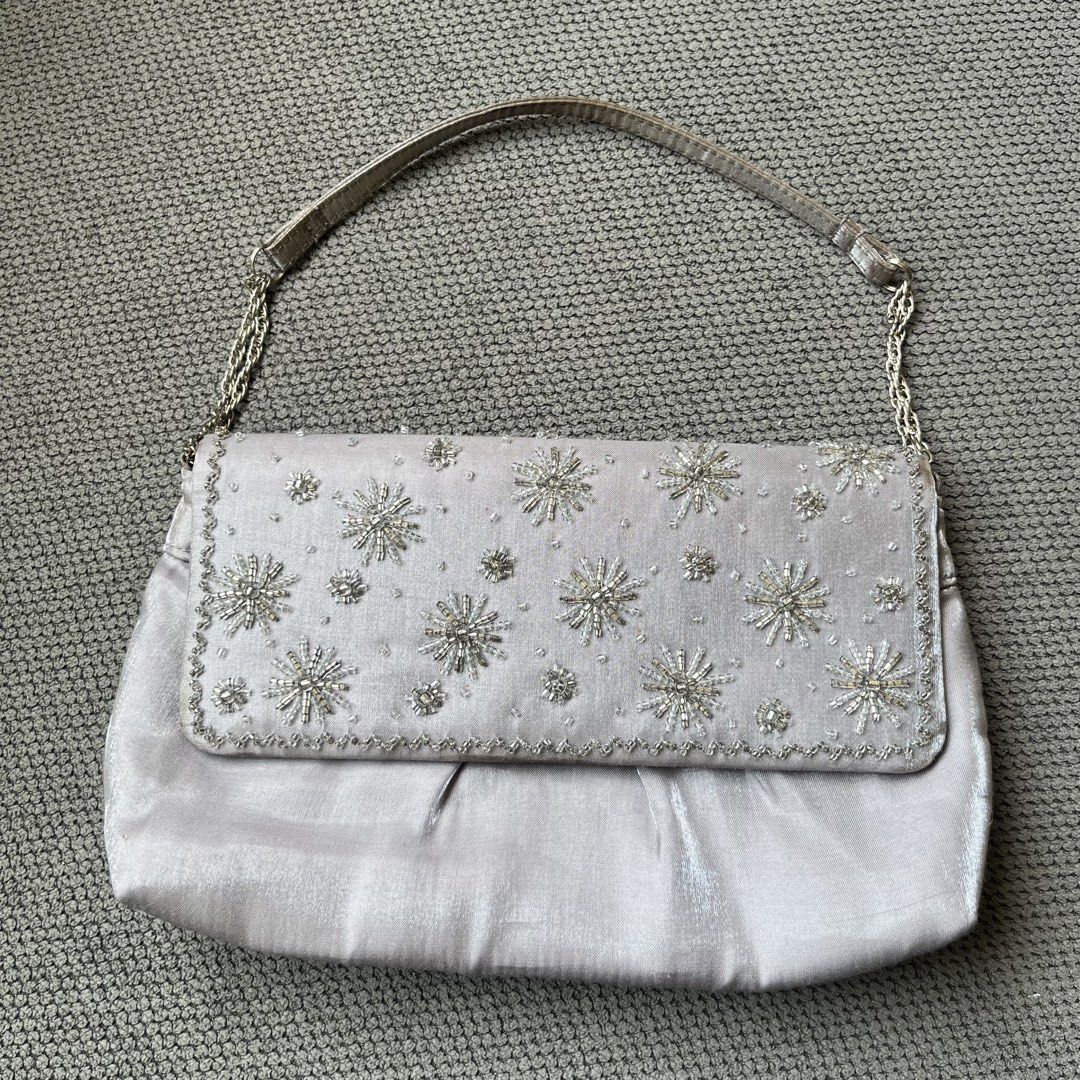 Silver Beaded Japan Mini Shoulder Party Bag (Category: Shoulder Bags) located in Silang. Submitted by f4iry4rch1ve (Listing ID 1442440448, Image 1). Description: Silver Beaded Japan Mini Shoulder Party Bag 650 php+ sf Condition: 10/10 Dimensions: view the pictures above -from Japan -1 compartments, 1 pocket inside - actual photos Note: Colors may vary due to lighting Please message me for shipping and payment method... .