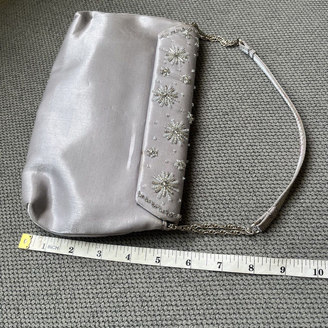 Silver Beaded Japan Mini Shoulder Party Bag (Category: Shoulder Bags) located in Silang. Submitted by f4iry4rch1ve (Listing ID 1442440448, Image 2). Description: Silver Beaded Japan Mini Shoulder Party Bag 650 php+ sf Condition: 10/10 Dimensions: view the pictures above -from Japan -1 compartments, 1 pocket inside - actual photos Note: Colors may vary due to lighting Please message me for shipping and payment method... .
