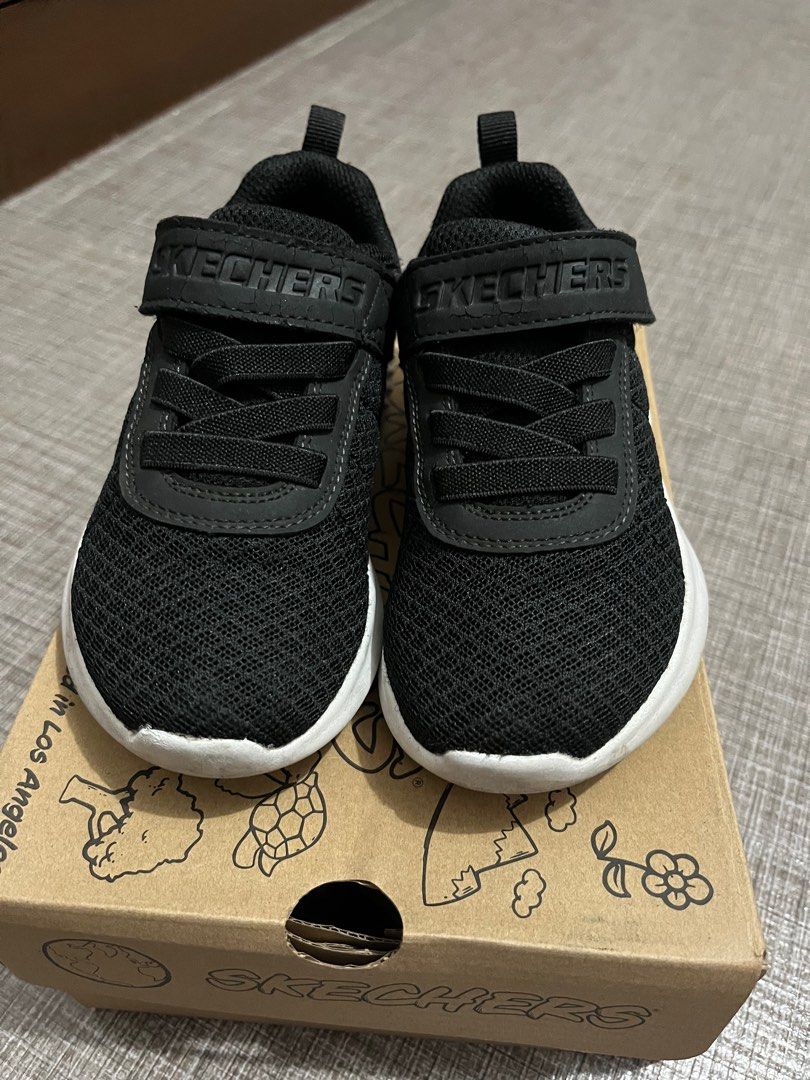 Skechers Black Rubber Shoes (Category: Babies & Kids Fashion) located in Manila. Submitted by gchlove (Listing ID 1442452617, Image 2). Description: Skechers Bounder Baronik Size 9US (15cm) Issue: crack on the shoe strap as seen in the photo.