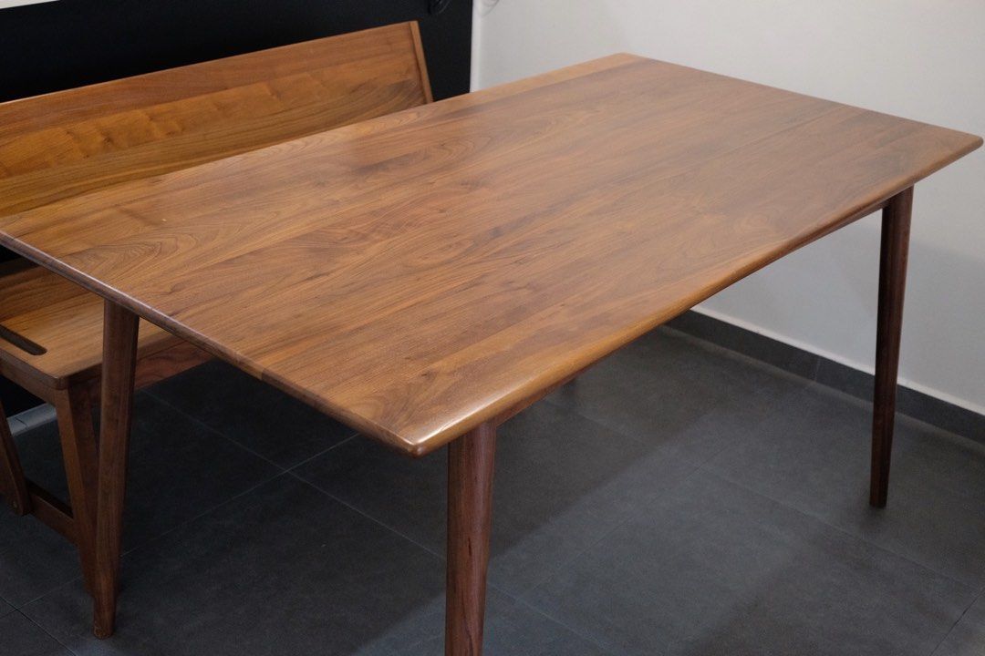 Solid Dark Walnut Wood Dining Table Eating Table Study Table (Category: Tables & Sets) located in Singapore. Submitted by findsandflip (Listing ID 1442348982, Image 2). Description: Made of Solid Dark Walnut Wood. In good working condition, carefully taken care of. Measurement: 1500mm x 800mm x 750mm.
