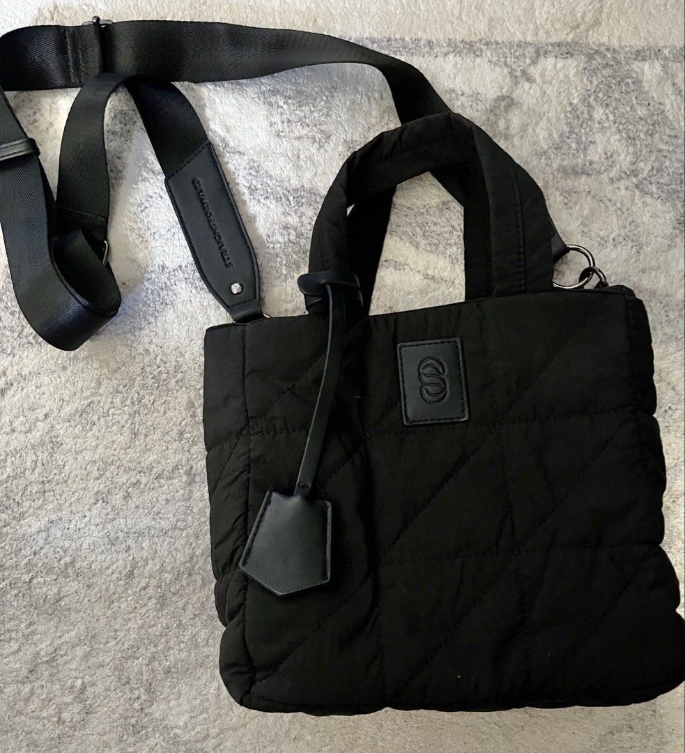 Take both Straightforward Noiva and Solari Tote Bag (Category: Tote Bags) located in Rizal. Submitted by cassappl (Listing ID 1442370385, Image 3). Description: - Cream and Black quilted tote bag from Straightforward - Features top handles and a detachable crossbody strap - Ideal for everyday use - Easily fits your essentials - Please check photos for more details.