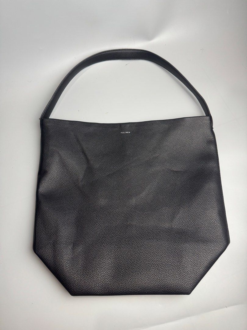 The Row - Park Large - Tote in Black (Category: Luxury Bags & Wallets) located in San Pablo. Submitted by _daddyrey (Listing ID 1442436243, Image 1). Description: The Row - Park Large - Tote in Black Rank S No flaws Excellent to new condition DM!.