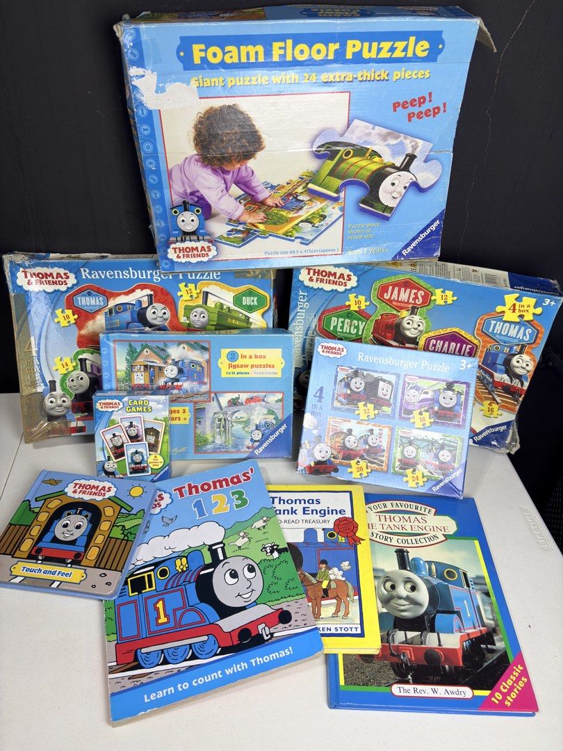 Thomas & Friends Puzzles, Books, and Card Games Bundle (Category: Board Games & Puzzles) located in Manila. Submitted by biboystoyhouse (Listing ID 1442529434, Image 1). Description: - Bundle of Thomas & Friends items - Large foam floor puzzle (24 pieces) - Several Ravensburger jigsaw puzzles featuring Thomas and friends - Thomas & Friends books, including 'Thomas' 123' and 'Thomas Tank Engine Story Collection' - Ideal for any Thomas fan! .
