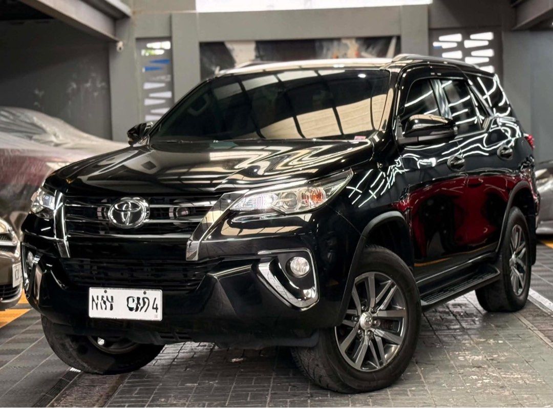 Toyota Fortuner G Auto (Category: Used Cars) located in Manila. Submitted by quality_cars (Listing ID 1442521776, Image 3). Description: FOR SALE‼️ 2018 Toyota Fortuner G A/T🔥 With 70k mileage only💯 Super class A legit unit Automatic transmission 2.4 diesel engine Ending plate ( 4 ) Paint/Body color ( black ) Super rare condition Complete papers / documents Ready to transfer 2 Original keys Casa maintained since day1 Compelte manual & warranty 