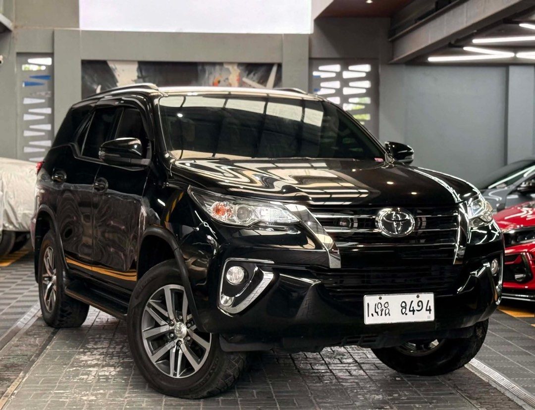 Toyota Fortuner G Auto (Category: Used Cars) located in Manila. Submitted by quality_cars (Listing ID 1442521776, Image 2). Description: FOR SALE‼️ 2018 Toyota Fortuner G A/T🔥 With 70k mileage only💯 Super class A legit unit Automatic transmission 2.4 diesel engine Ending plate ( 4 ) Paint/Body color ( black ) Super rare condition Complete papers / documents Ready to transfer 2 Original keys Casa maintained since day1 Compelte manual & warranty 