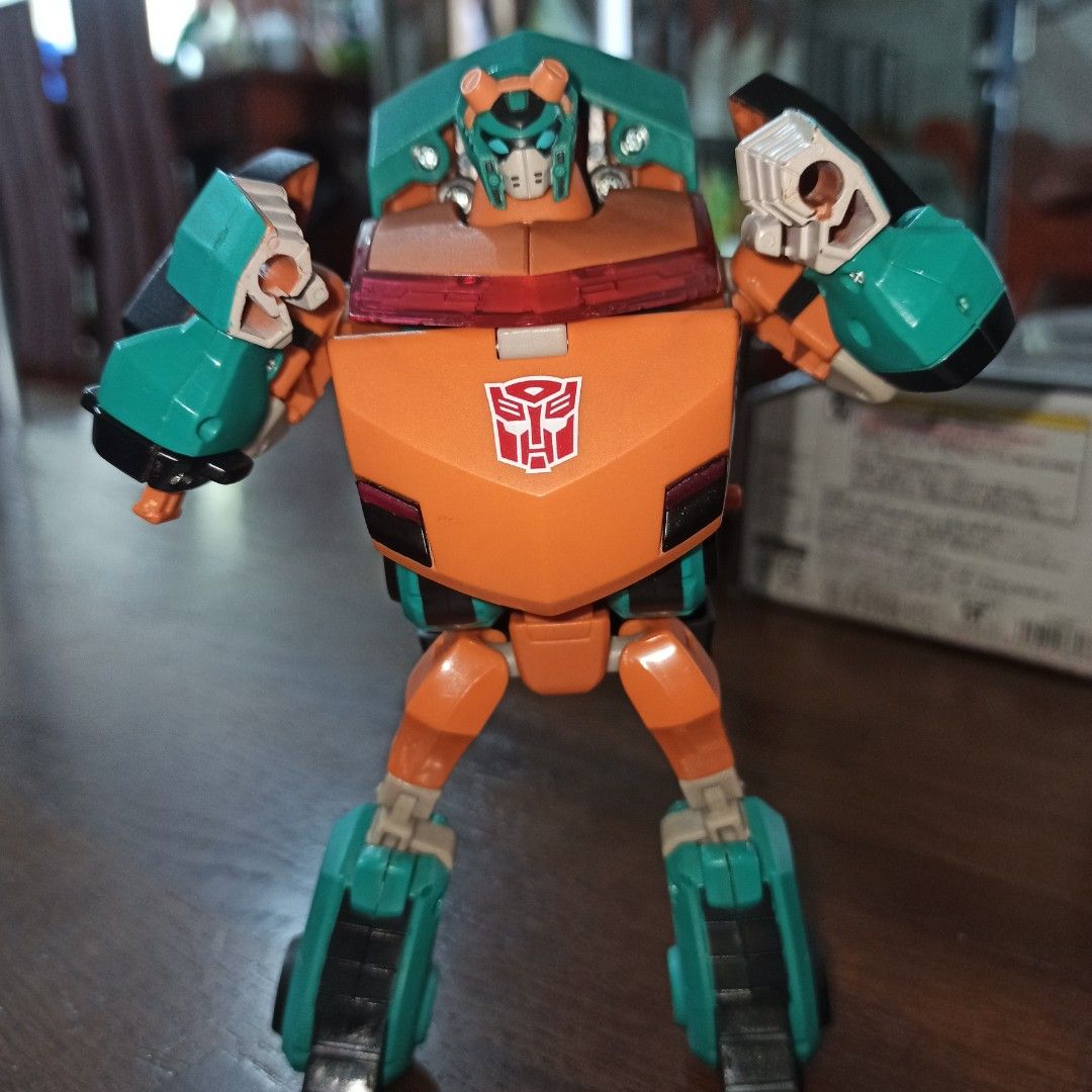 Transformers Animated Fisitron 2011 Botcon Exclusive with manuals (Category: Figurines & Statues) located in Paranaque City. Submitted by di.collector (Listing ID 1442398629, Image 1). Description: Remains one of the hardest-to-find official Animated mold variants in existence. Utilizing the excellent Animated Cybertronian Ratchet mold, this figure features Fisitron’s signature tan, teal, and black color palette, perfectly translating the fan-fav