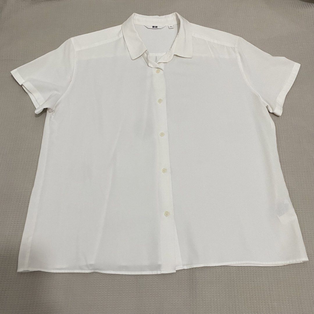 UNIQLO Rayon White Short Sleeve Button Up Blouse (Category: Blouses) located in Quezon City. Submitted by ndrmkl (Listing ID 1442439082, Image 1). Description: - Uniqlo white short sleeve button up - Sold out in-store and online - Phased out sharp sleeves design - With unnoticeable pinkish marks on the front (refer to photos for details) - Perfect for casual wear or layering Basics office layering japan GU casual.
