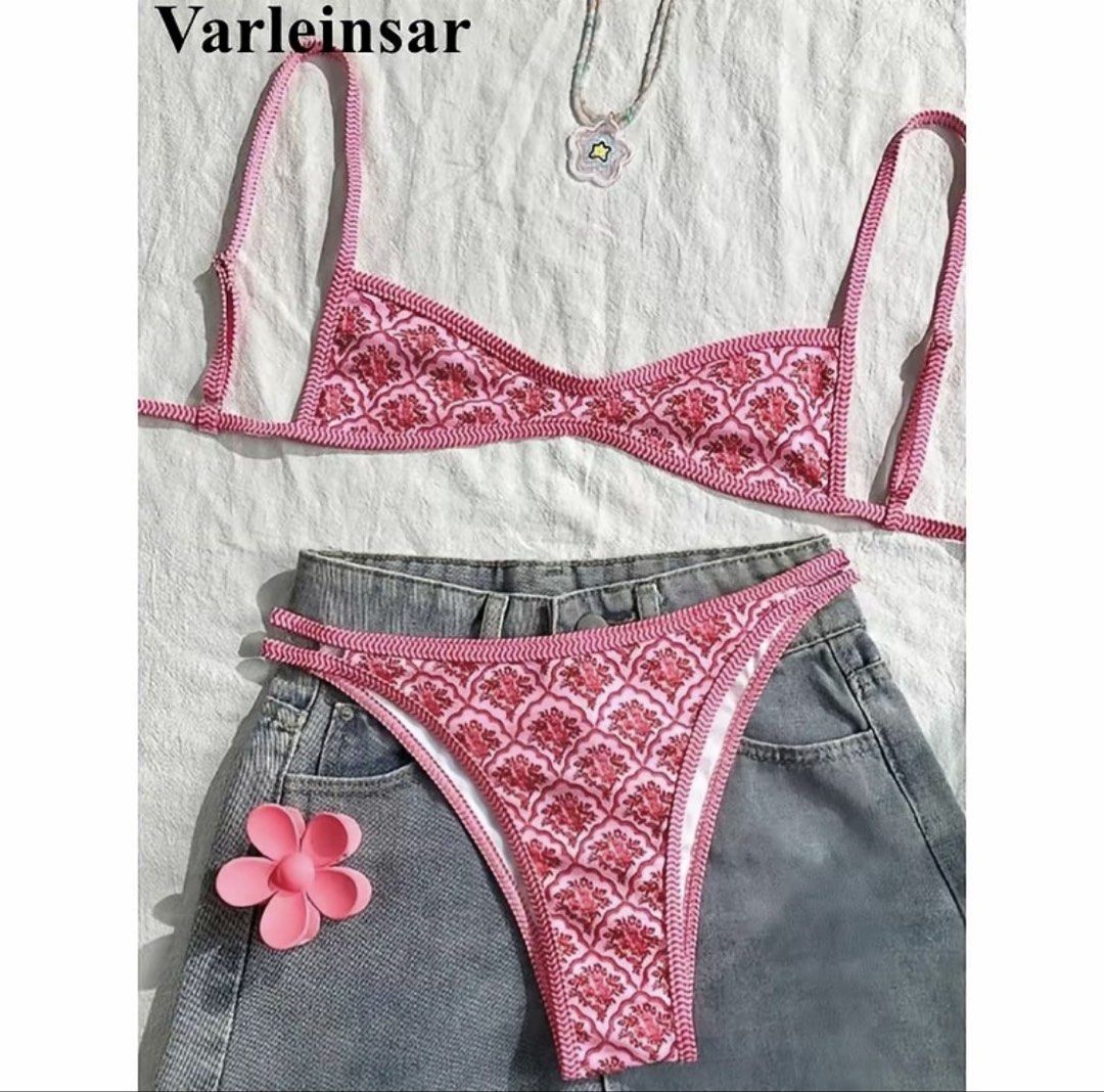 Varleinsar Pink Floral Print Bikini Set (Category: Bikinis & Swimsuits) located in Manila. Submitted by swiftdolphin.004224 (Listing ID 1442512342, Image 1). Description: - Pretty pink bikini with a floral pattern - Triangle top with adjustable straps - Matching high-cut bottoms - Ideal for beach days and pool parties - Super cute and stylish design.