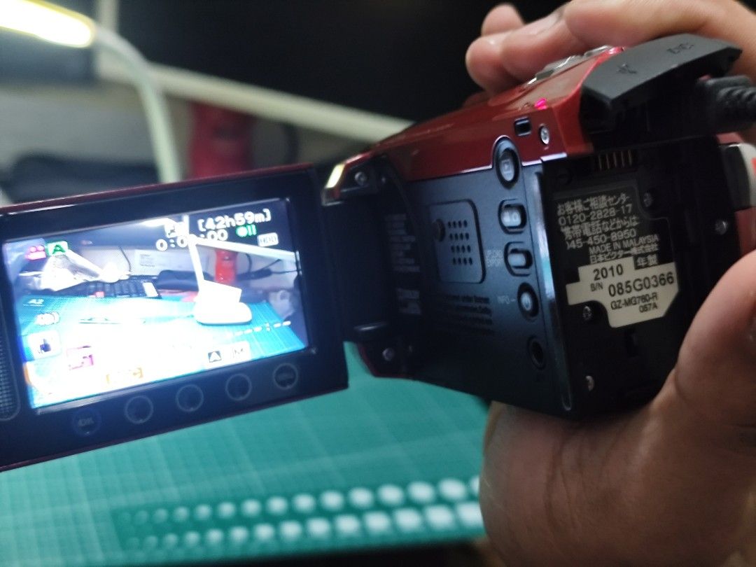 Victor Everio GZ-MG760-R (Category: Video Cameras) located in Malabon City. Submitted by jayveetotz (Listing ID 1442390511, Image 2). Description: - Victor Everio HD Camcorder - Records in High Definition (HD) - Powerful 45x Dynamic Zoom - Records directly to SD card - Flip-out LCD screen for easy viewing - Includes wrist strap - Tested and confirmed working -Sensor: 1/6 inch CCD Sensor -Super LoLux and Advanced Image Stabilizer) -Lens: Konica Mi