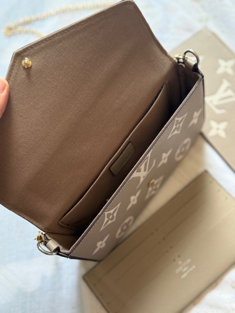 Wallet on Chain Bag (Category: Luxury Bags & Wallets) located in Las Pinas. Submitted by aki.lfinds (Listing ID 1442421147, Image 3). Description: - Wallet on Chain - Color: Neutral taupe with cream monogram - Includes separate cardholder - Detachable gold chain strap - Interior: Card slots and zipped pocket - Ideal for carrying essentials.