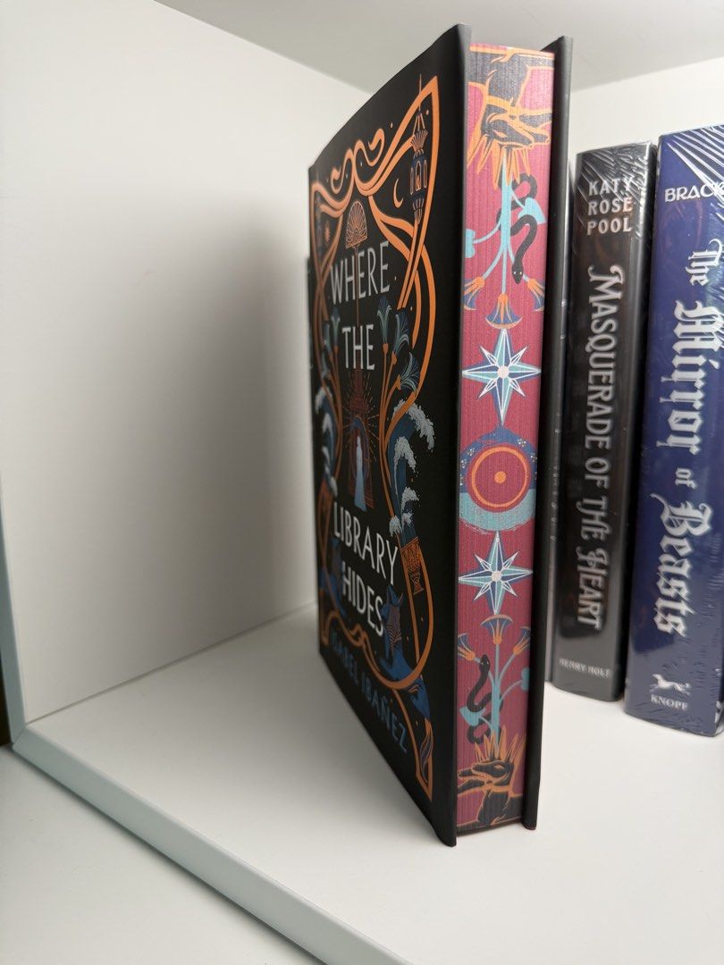 Where The Library Hides - OwlCrate Exclusive Edition (Category: Storybooks) located in Muntinlupa City. Submitted by bookcozi (Listing ID 1442416780, Image 2). Description: Where The Library Hides by Isabel Ibañez 💜 On Hand 💜 OwlCrate Exclusive Edition 💜 Signed by Author 💜 Bound in book Author Letter 💜 Redesigned Foiled exclusive Dust Jacket 💜 Stenciled Edges 💜 Hardcover exclusive foiled design 💜 Exclusive character art endpapers 💜 Exclu