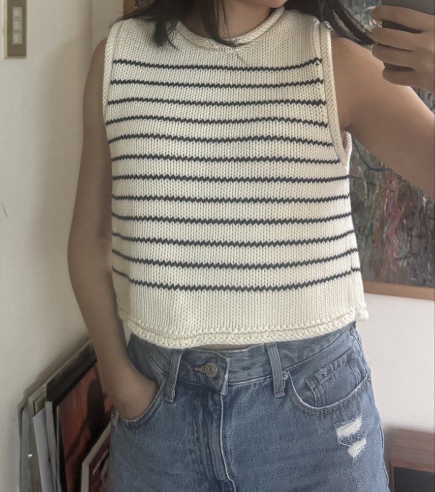 Zara Striped Knit Vest Top (Category: Sleeveless) located in Paranaque City. Submitted by migvee (Listing ID 1442050806, Image 2). Description: - Zara cream and navy striped knit vest - Sleeveless, cropped fit - Versatile for layering over t-shirts or wearing solo - Ideal for a casual, chic aesthetic - Easily pairs with jeans or shorts.