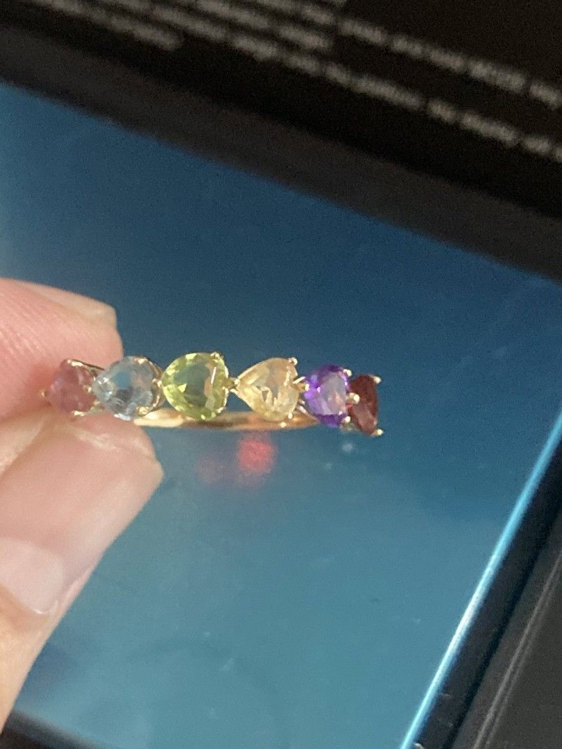 18K Gold Multi-Gemstone Heart Shape Ring (Category: Rings) located in Imus. Submitted by timelessfindph (Listing ID 1442658022, Image 2). Description: - Genuine 18K gold ring - Features a row of colorful heart-shaped gemstones - Clearly stamped '18K' on the band - Versatile: great for stacking or wearing alone - Adds a vibrant pop of color to any look - 1.75 Tcw stamp for the gemstone - with certificate.