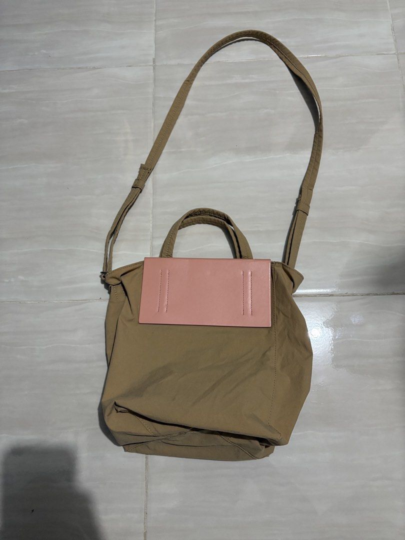 ACNE STUDIOS PAPERY NYLON TOTE BAG (Category: Luxury Bags & Wallets) located in Naga. Submitted by sislovesme (Listing ID 1442667212, Image 3). Description: EXCELLENT CONDITION NO FLAWS SIZE SMALL AUTHENTIC.