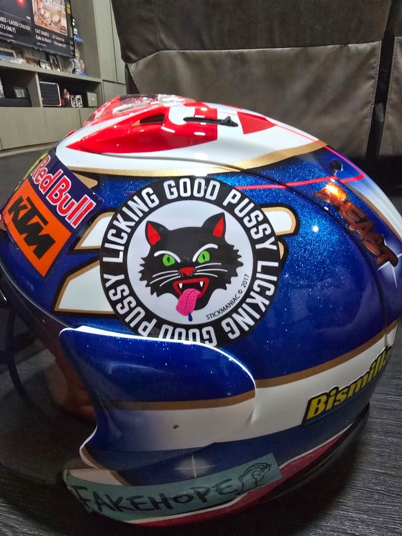 Arai helmet size L used (Category: Motorcycle Apparel) located in Singapore. Submitted by iworkformilkagain (Listing ID 1442701833, Image 3). Description: - Brand: Arai - Size: L - Condition: Used - Visor: Iridescent blue/green tint. stickers will be removed a small chip at the vent #arai #pedrosa #size L.