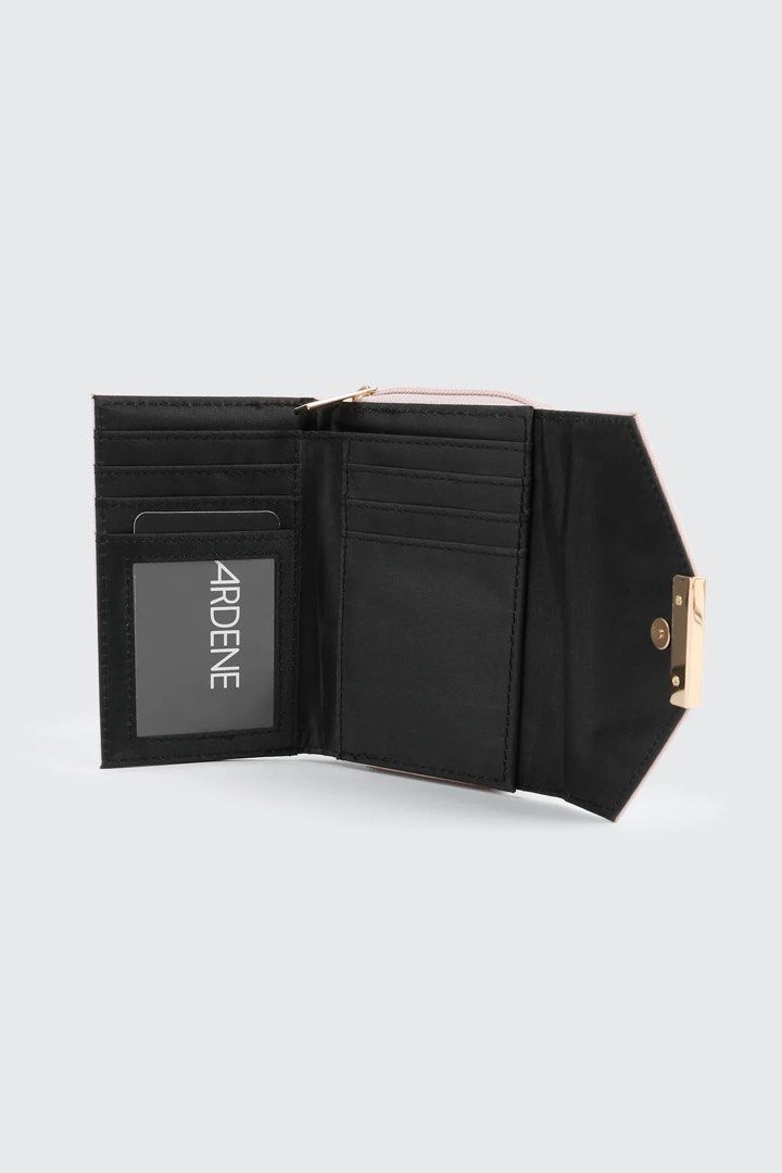 Ardene Pink Tri-Fold Wallet with Gold Accent (Category: Wallets & Card holders) located in Quezon City. Submitted by GlamourD (Listing ID 1442625612, Image 3). Description: - Cute pink tri-fold wallet from Ardene - Features a stylish gold bar detail on the front flap - Secure zipper closure on the side - Interior includes card slots and a clear ID window - Perfect for keeping your essentials organized - Small and compact design, fits easily in an