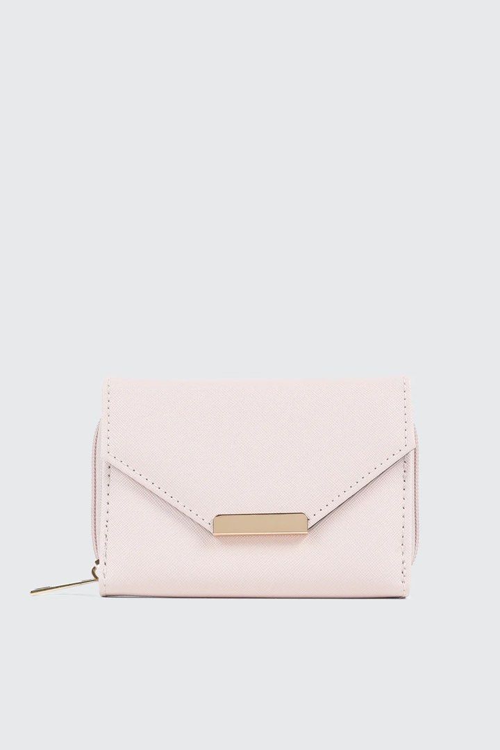 Ardene Pink Tri-Fold Wallet with Gold Accent (Category: Wallets & Card holders) located in Quezon City. Submitted by GlamourD (Listing ID 1442625612, Image 1). Description: - Cute pink tri-fold wallet from Ardene - Features a stylish gold bar detail on the front flap - Secure zipper closure on the side - Interior includes card slots and a clear ID window - Perfect for keeping your essentials organized - Small and compact design, fits easily in an