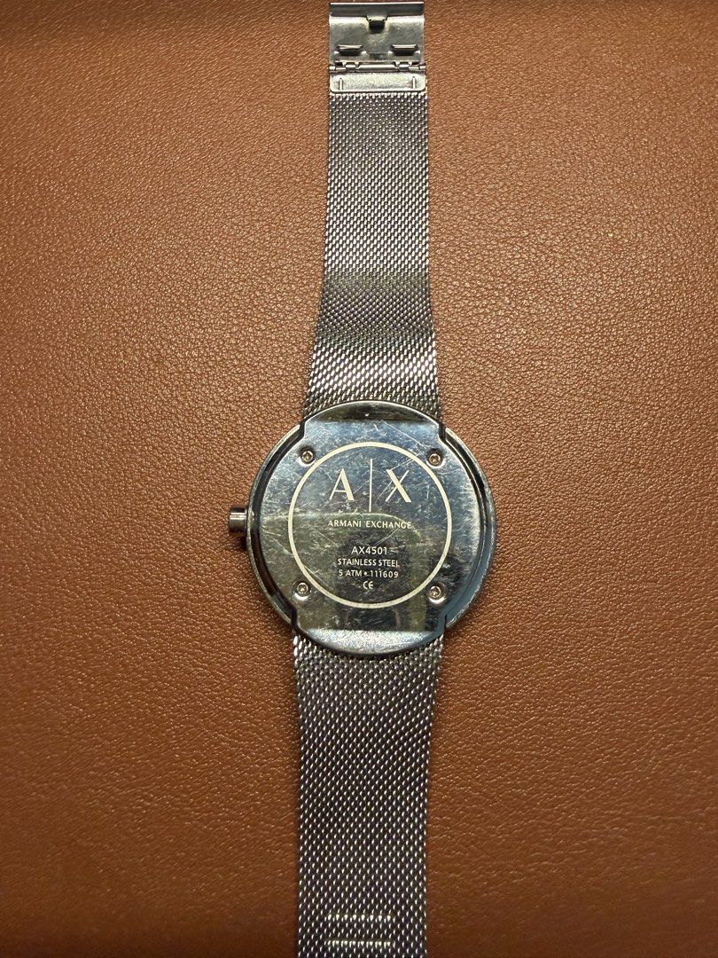Armani Exchange AX4501 Silver Mesh Watch (Category: Women's Watches) located in Manila. Submitted by pansitbatoh (Listing ID 1442554566, Image 3). Description: - Armani Exchange AX4501 Watch - In good working condition - Color: Silver - Strap: Stainless Steel Mesh - Dial: Clean, minimalist design with subtle crystal accents on bezel - Material: Stainless Steel - Style: Versatile for everyday or dressy occasions Price is still negotiable Pick up: 