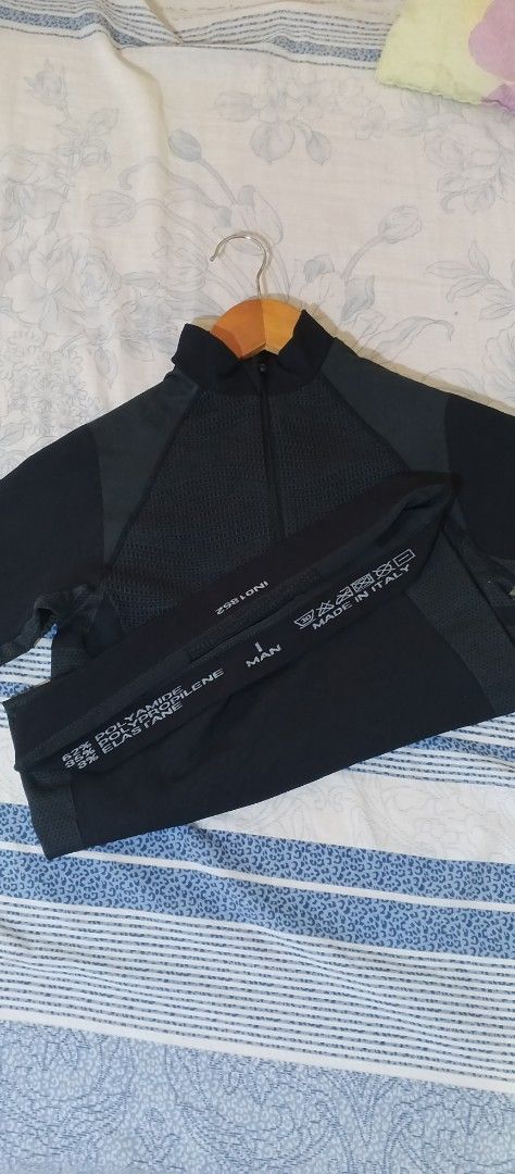 Assos Cycling Base Layer Long Sleeve Top (Category: Coats, Jackets and Outerwear) located in Cebu City. Submitted by selectbyselect (Listing ID 1442604399, Image 3). Description: - Assos long-sleeved cycling base layer - Color: Black with grey paneling - Features a quarter zip neck - Made in Italy - Ideal for layering on cooler cycling days.