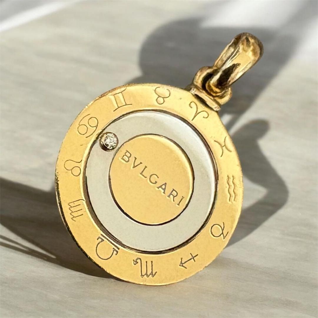 Authentic BVLGARI Horoscope Diamond Pendant K18 (Category: Necklaces) located in General Trias. Submitted by japan_secondhand_products (Listing ID 1442543152, Image 1). Description: This is a necklace (pendant). You can also rotate the diamond to match your zodiac sign. It can be used for any zodiac sign. It uses K18 material, which is currently very expensive. This is a luxurious and stylish top. There are some scratches and stains, but personal