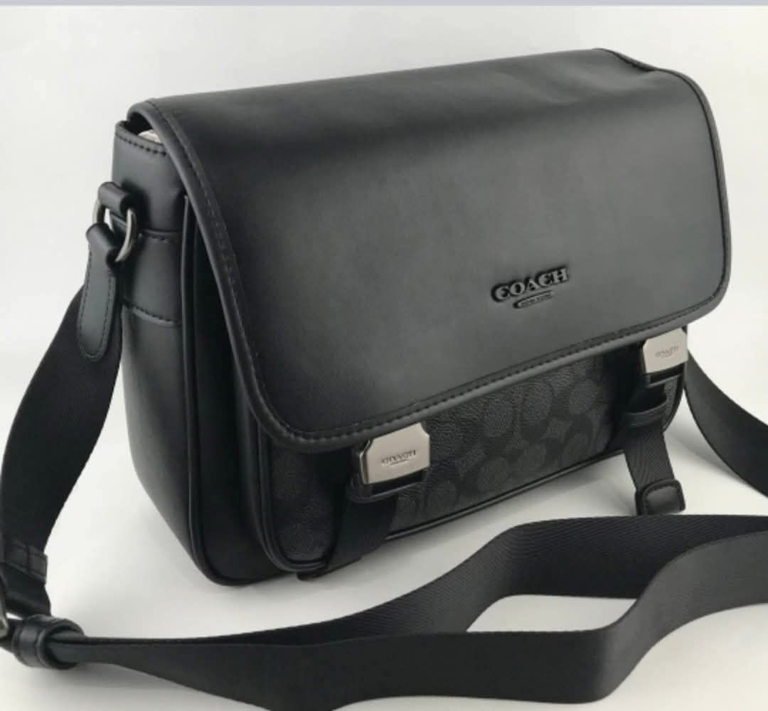 Coach Racer Messenger men bag (Category: Luxury Bags & Wallets) located in Manila. Submitted by yukionnana (Listing ID 1442687575, Image 2). Description: AUTHENTIC COACH 100% Authentic Coach -Made in Vietnam / Japan Import Price ₱4,499 + shipping fee This Coach Racer Messenger Bag is crafted from charcoal signature coated canvas and smooth black leather, featuring a distinct speedclip closure. ✅bulk's orders with discount 😍 ✅ BRAND NEW ✅ 100% Au
