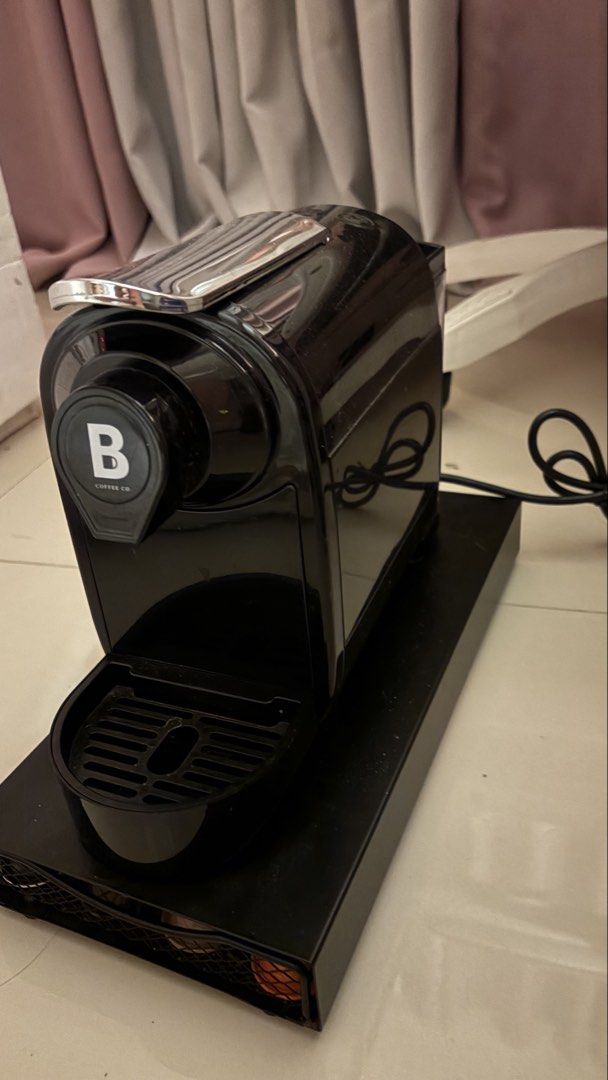 B Coffee Co. Capsule Coffee Machine with Pod Drawer (Category: Coffee Machines & Makers) located in Quezon City. Submitted by ngthanawa (Listing ID 1442680509, Image 3). Description: - Black B Coffee Co. capsule coffee machine - Compact and sits on its included black drawer - Drawer provides convenient pod storage - Some coffee pods are already included - Easy to use for quick home-brewed coffees - With free frother NO BOX INCLUDED FIX PRICE.
