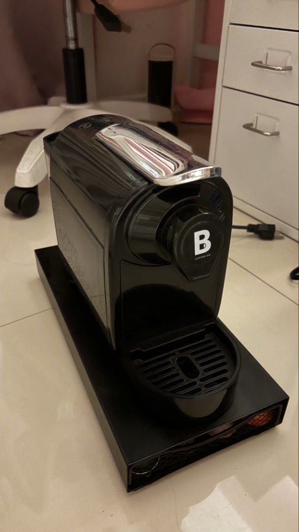 B Coffee Co. Capsule Coffee Machine with Pod Drawer (Category: Coffee Machines & Makers) located in Quezon City. Submitted by ngthanawa (Listing ID 1442680509, Image 1). Description: - Black B Coffee Co. capsule coffee machine - Compact and sits on its included black drawer - Drawer provides convenient pod storage - Some coffee pods are already included - Easy to use for quick home-brewed coffees - With free frother NO BOX INCLUDED FIX PRICE.
