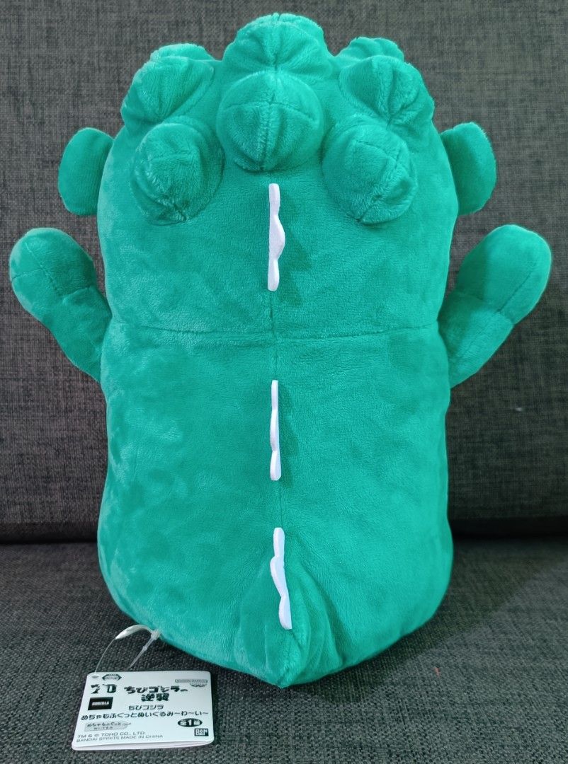 Banpresto Chibi Godzilla Plush Toy (Category: Plushies & Soft Toys) located in San Pedro. Submitted by max__collectibles (Listing ID 1442657131, Image 3). Description: - Adorable Chibi Godzilla plush toy - Approximately 12 inches tall - Made by Banpresto - Soft and huggable material - Ideal for Godzilla fans and collectors - Great for display or playtime.