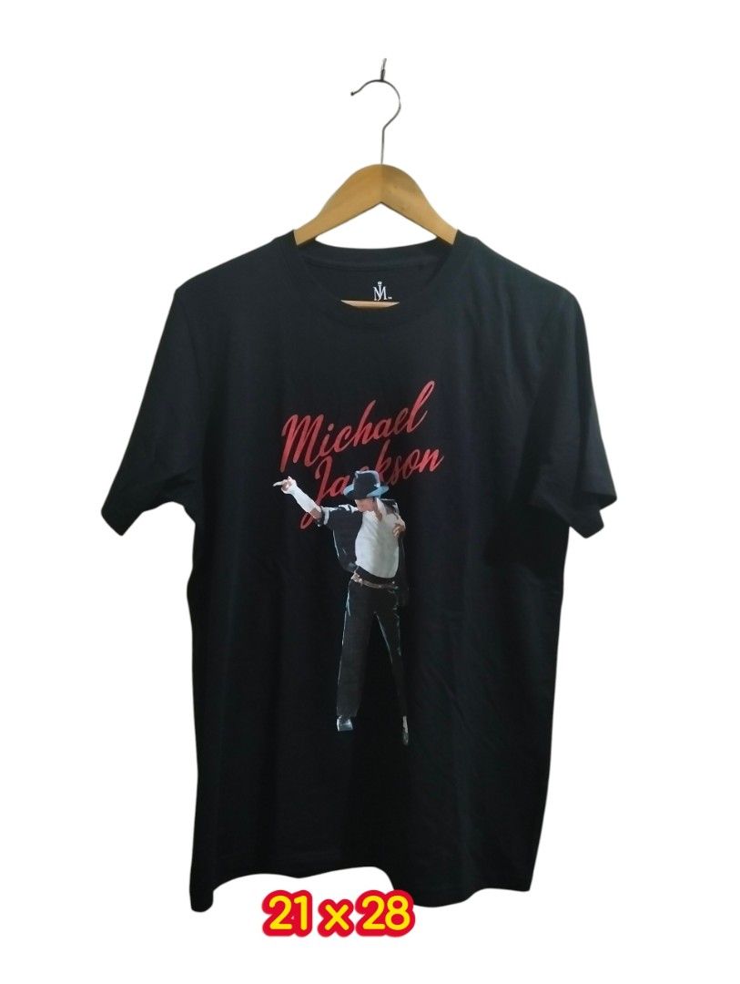Black Michael Jackson Graphic T-Shirt (Category: Tshirts & Polo Shirts ) located in Manila. Submitted by badsaints (Listing ID 1442627797, Image 1). Description: - Cool black t-shirt with Michael Jackson graphic print. - Features his name in red script. - Perfect for any Michael Jackson fan. - Measurements: 21 inches wide x 28 inches long. - Ready for a new home!.