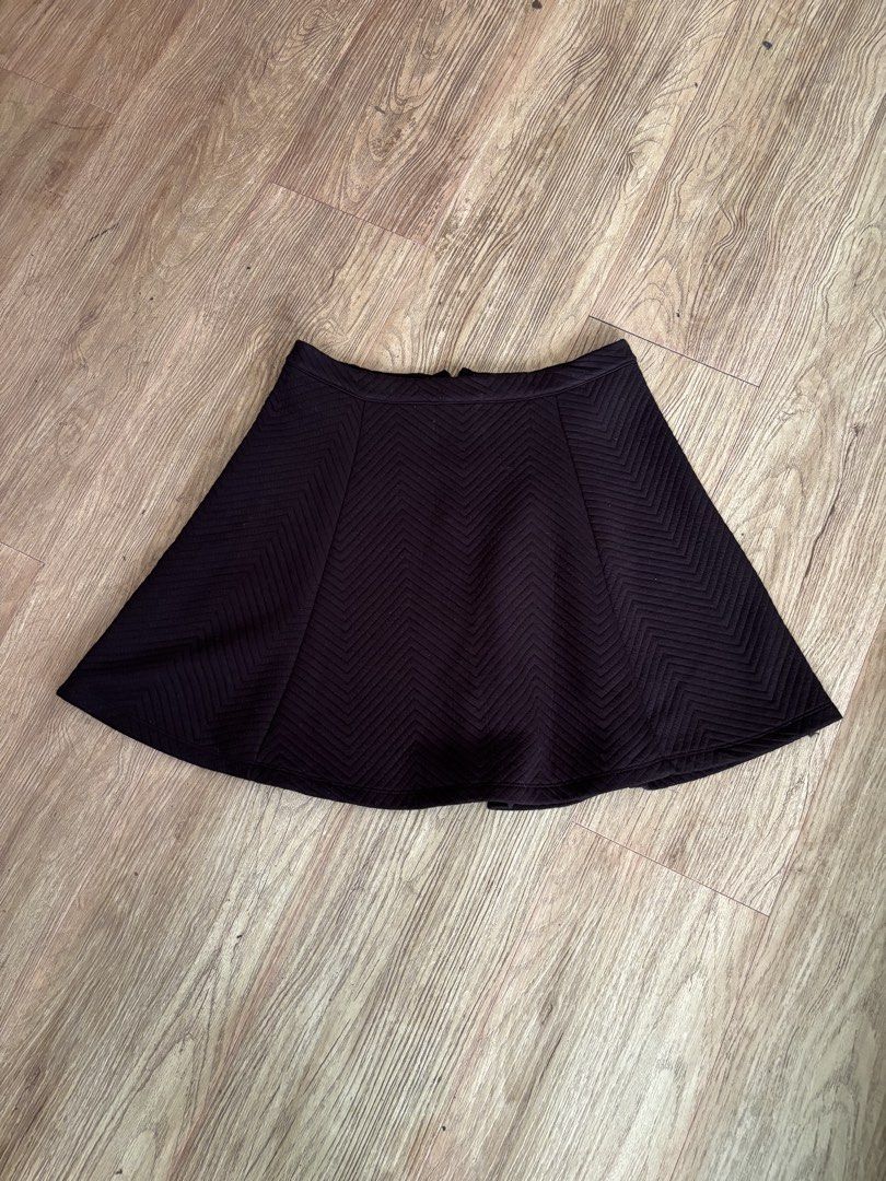 Blush Black Textured A-Line Skirt (Category: Skirts) located in Paranaque City. Submitted by aliyahhh. (Listing ID 1442617010, Image 1). Description: - Black A-line skirt from Blush - Features a unique textured chevron pattern all over - Convenient back zipper closure - Versatile piece for casual outings or dressing up - Effortlessly pairs with various tops.