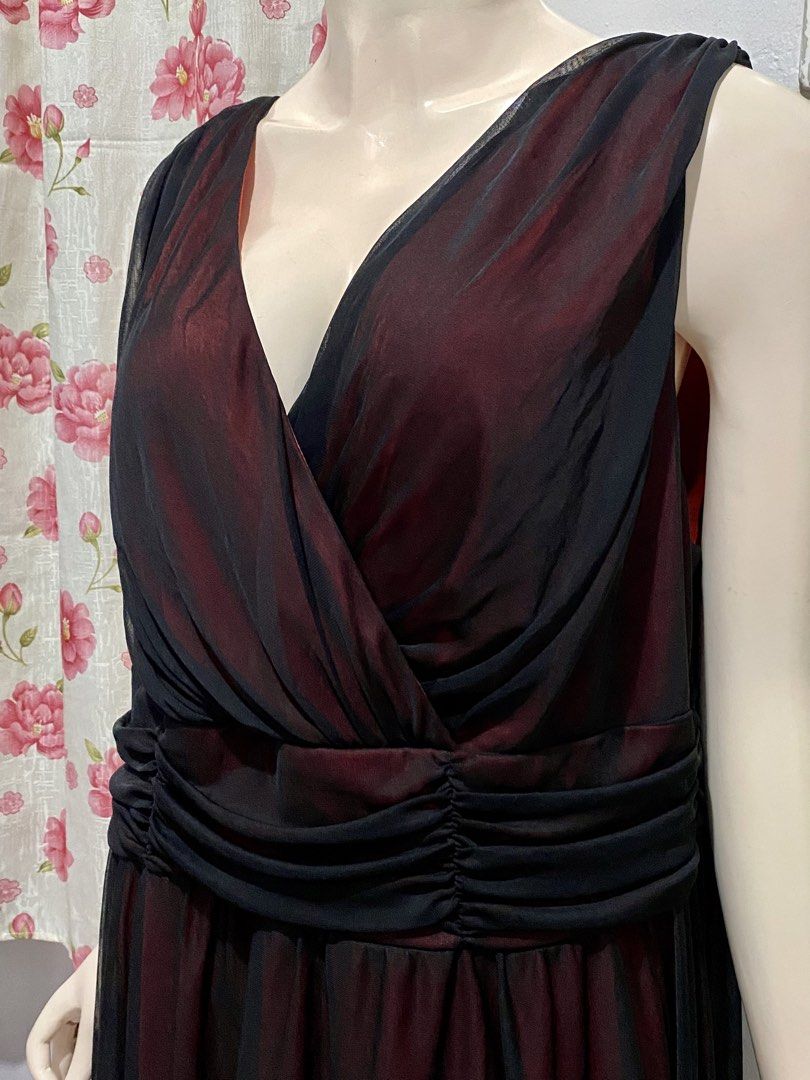 CA Cocktail party Dress (Category: Dresses) located in Binan City. Submitted by myutopia28 (Listing ID 1442617561, Image 2). Description: Connected Apparel cocktail party dress featuring a signature sheer black chiffon overlay. Connected ApparelDesign Features:Vibrant dark red/burgundy interior lining.Sheer black mesh/chiffon outer overlay creating an elegant multi-tone ombre effect.Deep overlapping V-neckline bodice. Highly flattering, gathered/