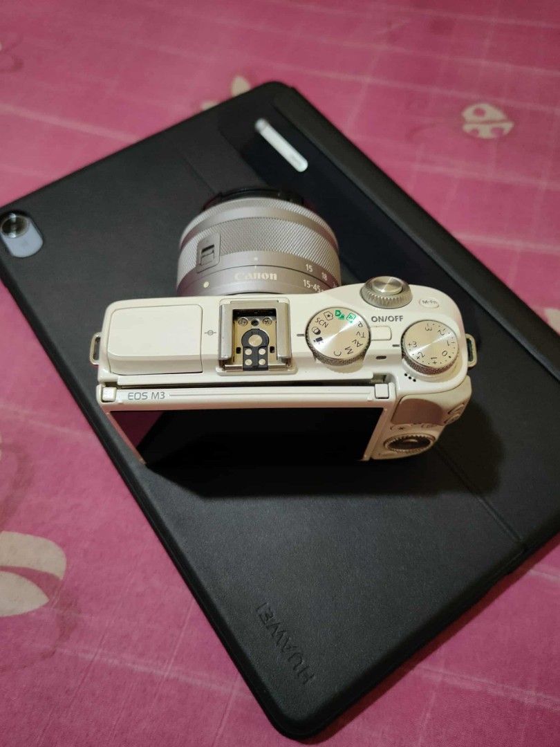 Canon EOS M3 Mirrorless Camera with 15-45mm Lens (Category: Cameras) located in Calamba. Submitted by mrbustamante223 (Listing ID 1442720455, Image 1). Description: - Canon EOS M3 mirrorless camera - Color: White body - Lens: 15-45mm kit lens (Silver) - Ideal for everyday shots and travel - with minimal issue - Great for beginners and enthusiasts -2nd hand unit and charger with free camera bag.