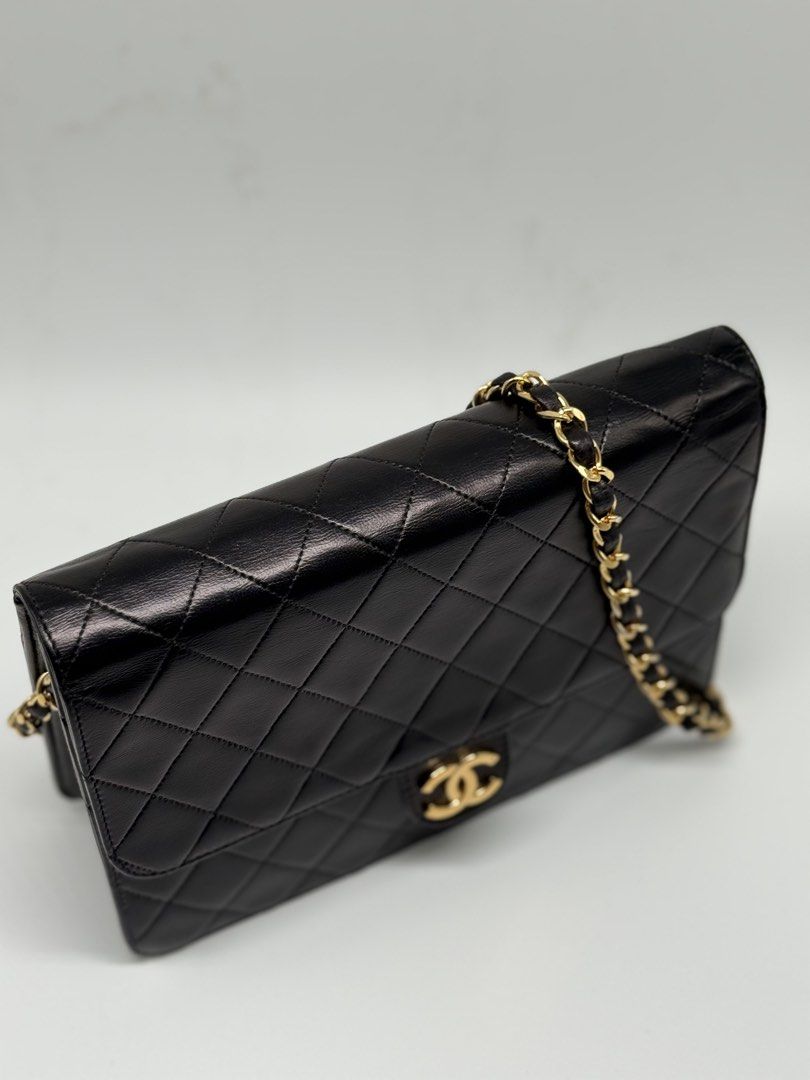 Chanel Black Quilted Leather Classic Flap Bag (Category: Luxury Bags & Wallets) located in Manila. Submitted by rec9358 (Listing ID 1442626187, Image 3). Description: - Classic Chanel flap bag - Black quilted lambskin leather - 24k Gold chain strap - Includes original box and dust bag - Timeless and authentic piece.