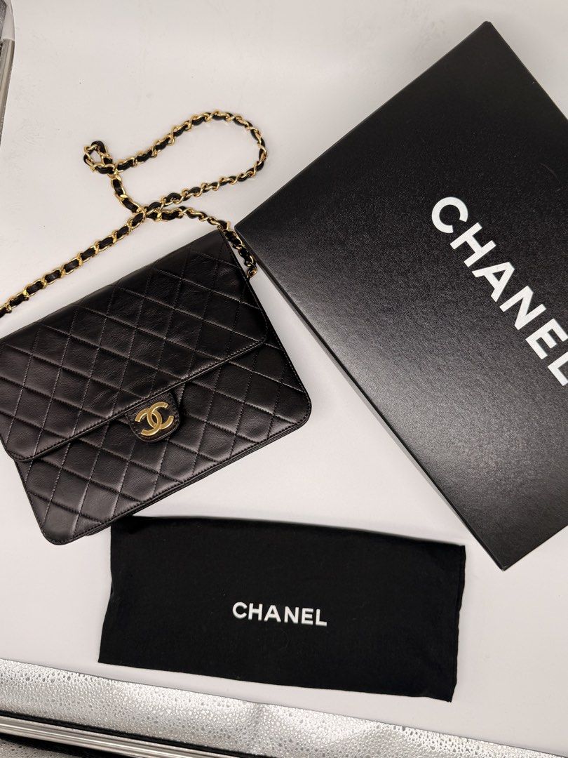 Chanel Black Quilted Leather Classic Flap Bag (Category: Luxury Bags & Wallets) located in Manila. Submitted by rec9358 (Listing ID 1442626187, Image 2). Description: - Classic Chanel flap bag - Black quilted lambskin leather - 24k Gold chain strap - Includes original box and dust bag - Timeless and authentic piece.