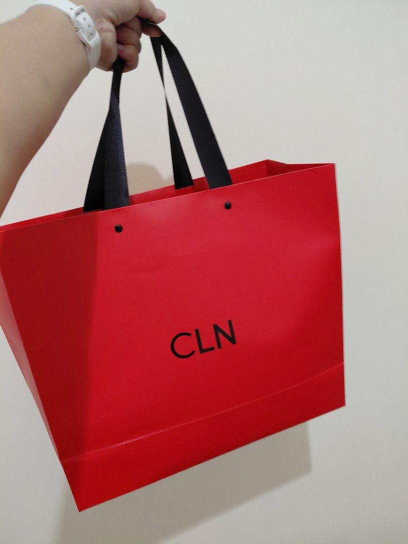 CLN Brown Shoulder Bag with Gold Clasp (Category: Shoulder Bags) located in Imus. Submitted by Kayce (Listing ID 1442613416, Image 2). Description: - Brand: CLN - Color: Brown - Style: Shoulder bag - Closure: Gold chain-like clasp - Includes: Dust bag, original CLN shopping bag - Condition: Minimal signs of wear, clean interior - Versatile: Suitable for everyday or special occasions.