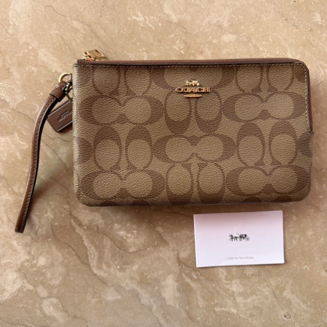 Coach Large Double Zip Wristlet (Category: Luxury Bags & Wallets) located in Bacolod City. Submitted by lalascloset_ (Listing ID 1442558940, Image 1). Description: - 100% original - no flaws - rarely used!.