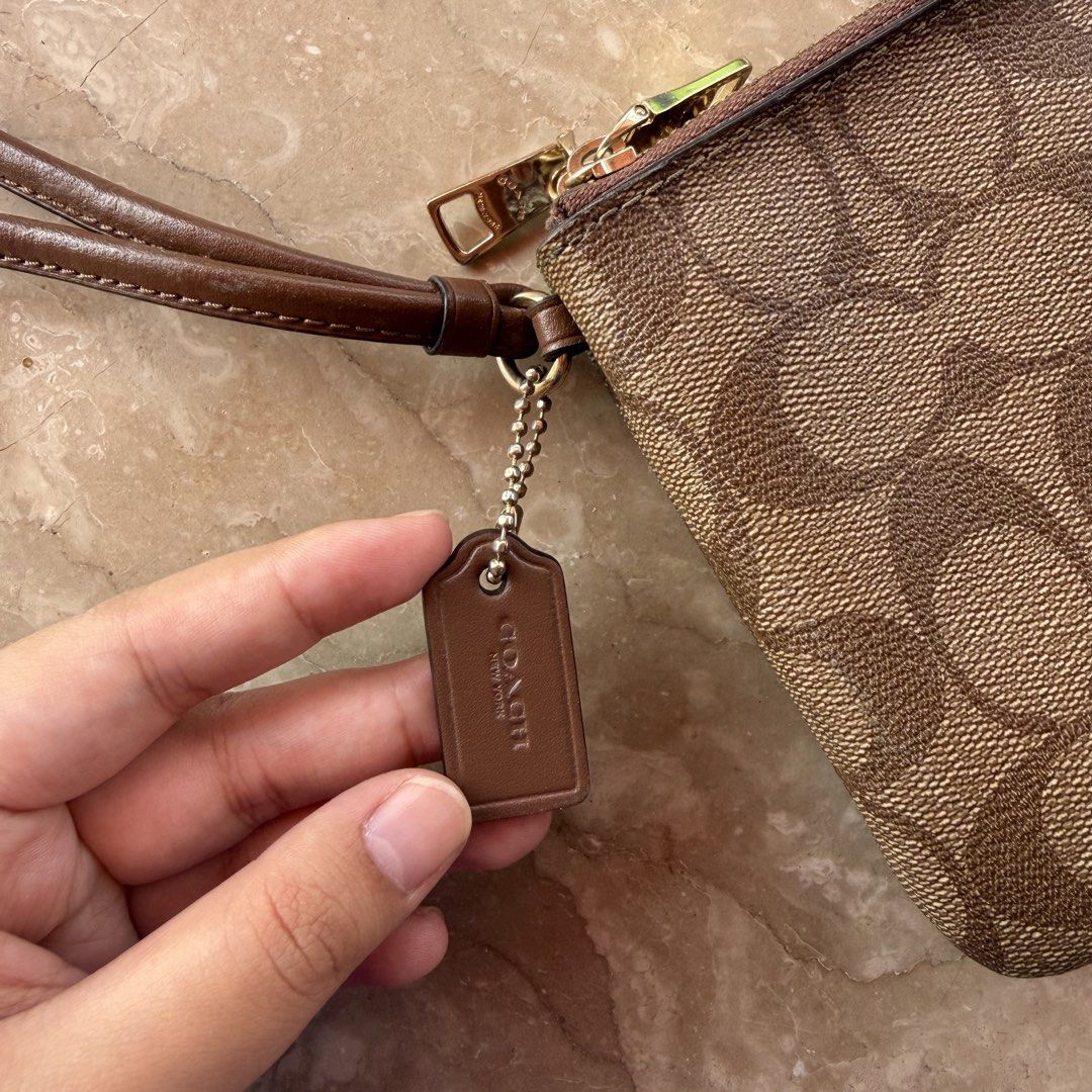 Coach Large Double Zip Wristlet (Category: Luxury Bags & Wallets) located in Bacolod City. Submitted by lalascloset_ (Listing ID 1442558940, Image 3). Description: - 100% original - no flaws - rarely used!.