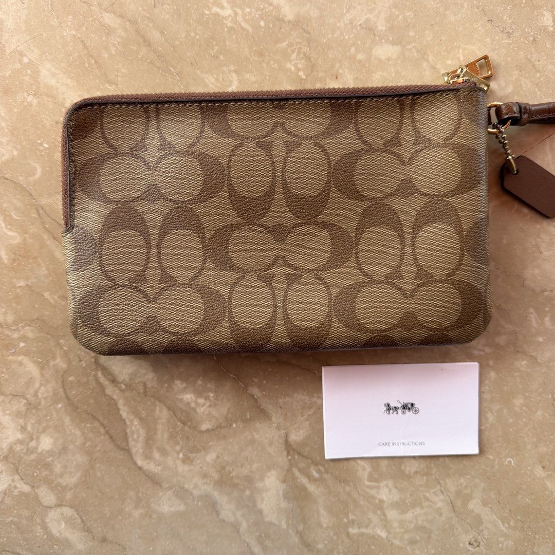 Coach Large Double Zip Wristlet (Category: Luxury Bags & Wallets) located in Bacolod City. Submitted by lalascloset_ (Listing ID 1442558940, Image 2). Description: - 100% original - no flaws - rarely used!.