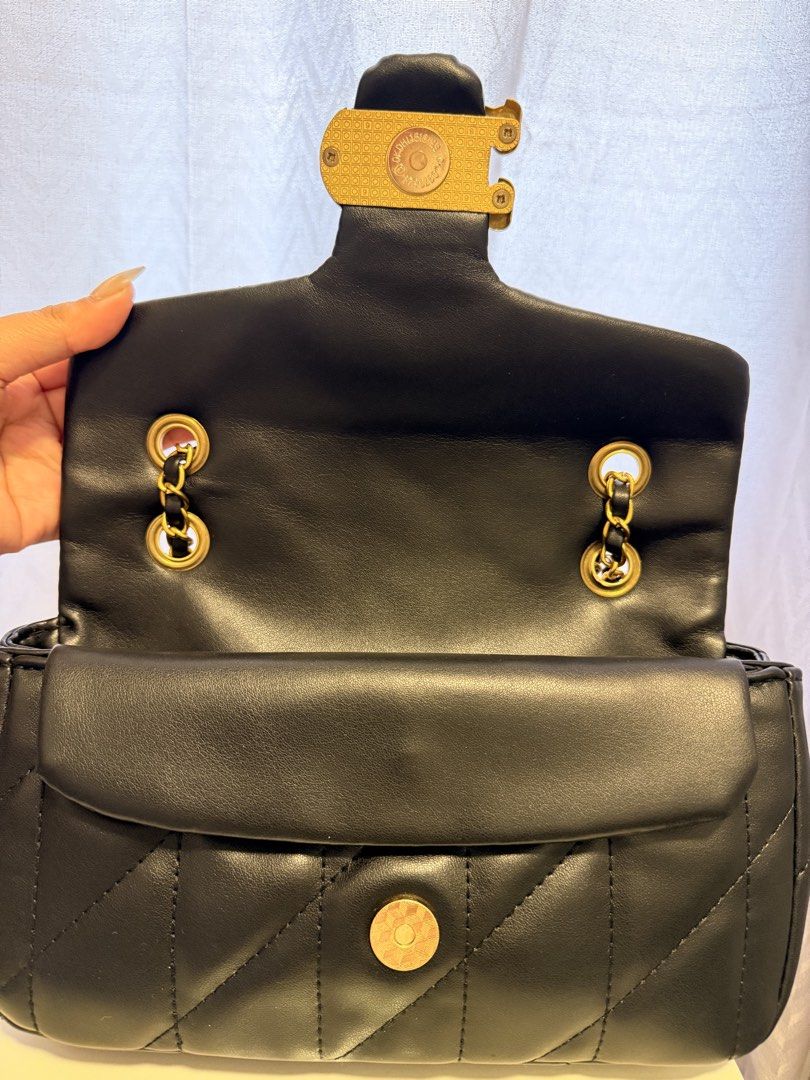 Coach Pillow Tabby Shoulder Bag 18 Black (Category: Luxury Bags & Wallets) located in Manila. Submitted by migeyaa (Listing ID 1442727789, Image 3). Description: - Black quilted leather shoulder bag - Iconic gold C logo hardware - Stylish chain strap detail - Comes with original box and dust bag - Versatile for day or night use.