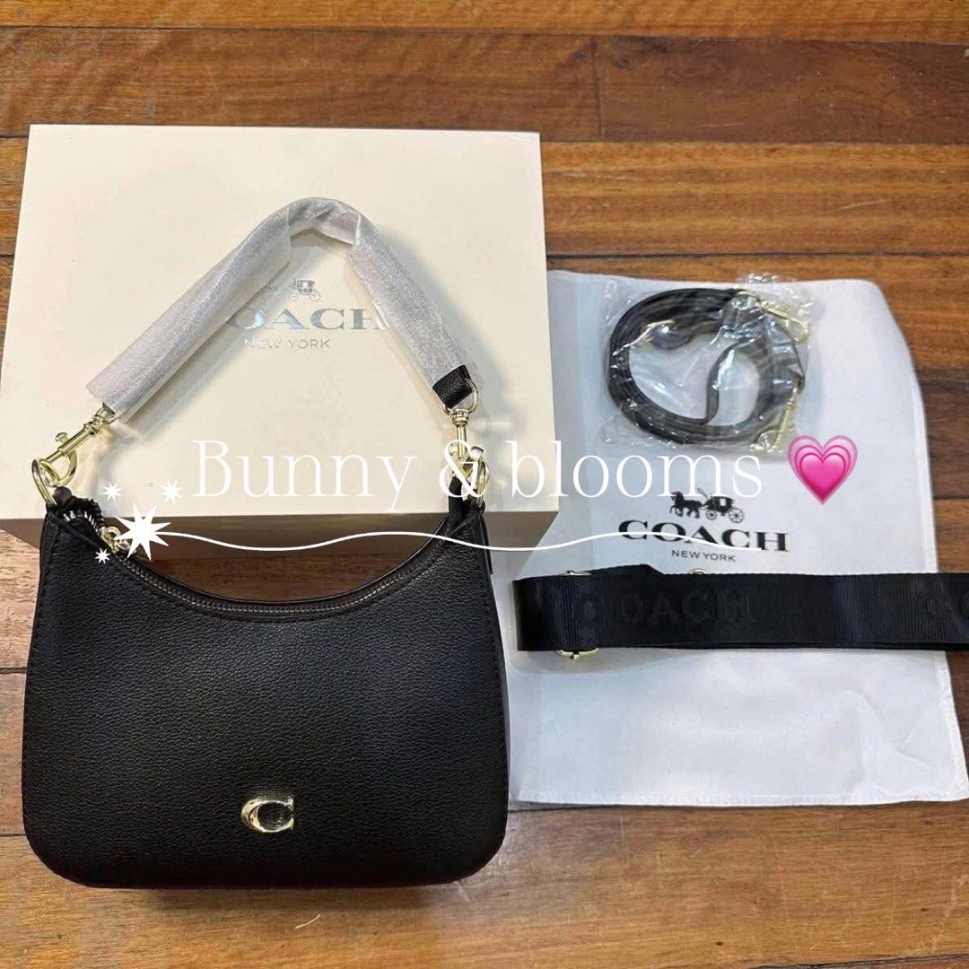 Coach Shoulder Bag - Multiple Colors Available (Category: Luxury Bags & Wallets) located in Paranaque City. Submitted by madz_44444 (Listing ID 1442588827, Image 2). Description: - Coach shoulder bag - Available colors: Black, White, Dark Brown Signature Print, Beige Signature Print - Includes dust bag receipt and box - Comes with an adjustable crossbody strap - Ideal for everyday use.